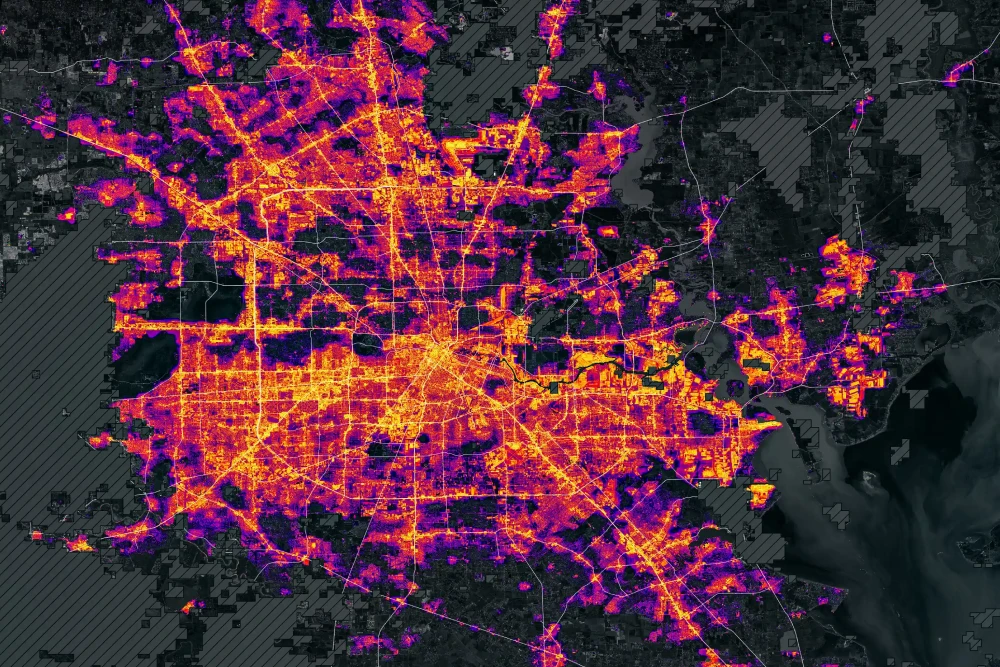 Thermal satellite map of an urban area at night showing heat emission intensity across road networks and city infrastructure – GESat hyperspectral data